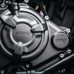 Detailed view of a Yamaha motorcycle engine's CP2 part, showcasing industrial design.