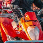 Experience the thrill of quad biking with helmets in Morocco's vast desert landscape.